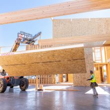 construction workers framing a building