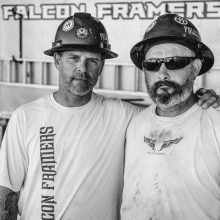 Two construction workers in black and white